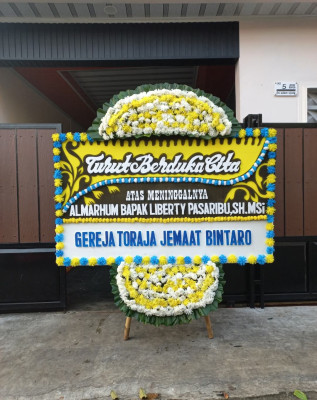 Papan Bunga Duka di Minggir